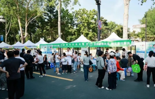粽香浸润新民大街，十三水游戏网义诊给健康素养“加满油”！